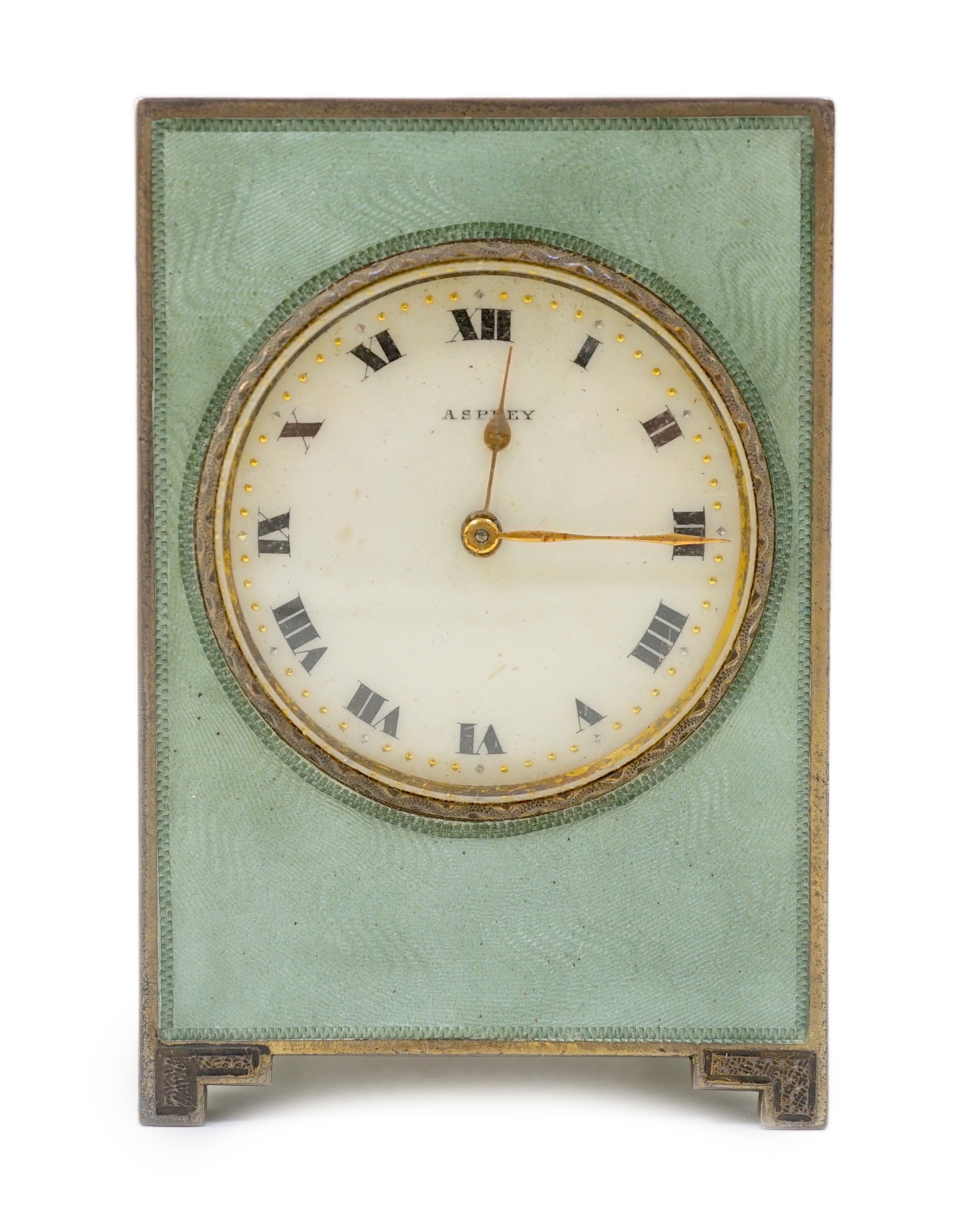 A George V silver and green guilloche enamelled travelling timepiece, retailed by Asprey, in original case